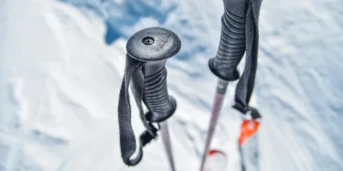 how to hold ski poles